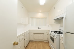 Kitchen with White Appliances and White Cabinets