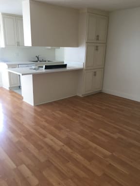 Kitchen with White Appliances and White Cabinets