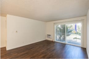 Living Room with Hardwood Floors and Patio Doors