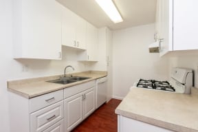 Kitchen with White Appliances and White Cabinets