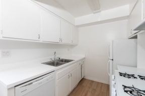 Kitchen with White Appliances and White Cabinets