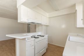 Kitchen with White Appliances and White Cabinets