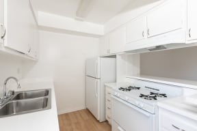 Kitchen with White Appliances and White Cabinets