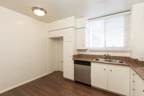 Kitchen with Stainless Steel Appliances and White Cabinets