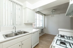 Kitchen with White Appliances and White Cabinets
