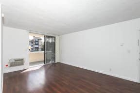 Living Room with Hardwood Floors and Patio Doors