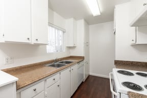 Kitchen with White Appliances and White Cabinets