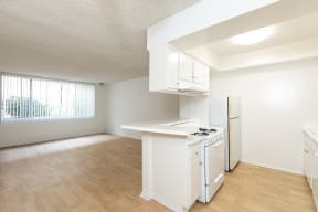 Kitchen with White Appliances and White Cabinets