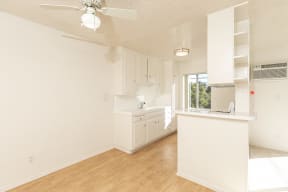 Dining Room with Hardwood Floors and Fan