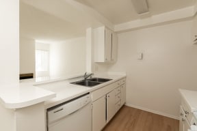 Kitchen with White Appliances and White Cabinets