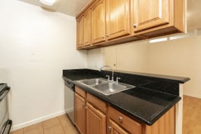 Kitchen with Stainless Steel Appliances and Wood Cabinets