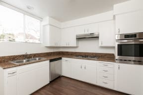 Kitchen with Stainless Steel Appliances and White Cabinets