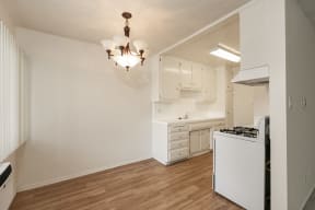 Dining Room with Hardwood Floors and Chandelier