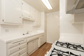 Kitchen with White Appliances and White Cabinets