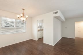 Dining Room with Hardwood Floors and Chandelier