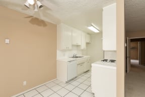 Kitchen with White Appliances and White Cabinets