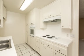 Kitchen with White Appliances and White Cabinets