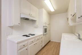 Kitchen with White Appliances and White Cabinets
