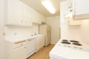 Kitchen with White Appliances and White Cabinets