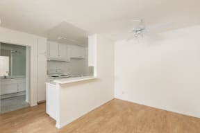 Dining Room with Hardwood Floors and Fan
