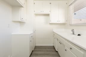 Kitchen with White Appliances and White Cabinets