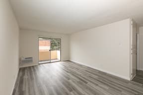 Living Room with Hardwood Floors and Patio Doors