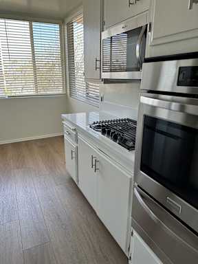 Kitchen with wood flooring