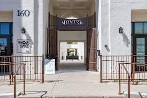 The entrance to a building with a sign that reads "MONTE".
