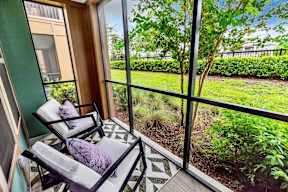 Patio with chairs at POINTE AT EAST SHORE APARTMENTS, Florida