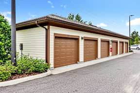 Row of garages at POINTE AT EAST SHORE APARTMENTS, APOPKA, Florida