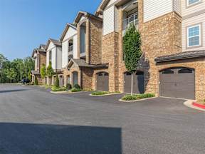 Row of Houses with garages at One White Oak Apartments, Georgia, 30041