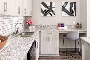 Kitchen with Granite Countertop at One White Oak Apartments, Cumming, GA