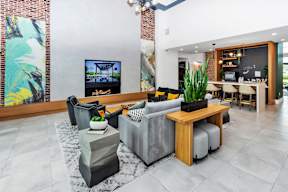 Clubhouse Living room and Kitchen at POINTE AT EAST SHORE APARTMENTS, Florida