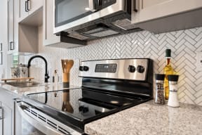 Kitchen with a Stove at DAWSON PARK APARTMENTS, BATON ROUGE, LA, 70809