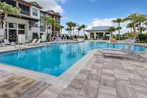 Resort style swimming pool at POINTE AT EAST SHORE APARTMENTS, APOPKA, FL