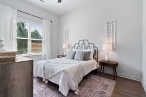 Bedroom with a Bed at DAWSON PARK APARTMENTS, BATON ROUGE, Louisiana
