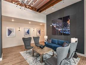 Comfortable sofas and chairs in Coda Orlando clubhouse for resident use in Orlando, FL apartments for rent at CODA Apartments , Florida, 32826