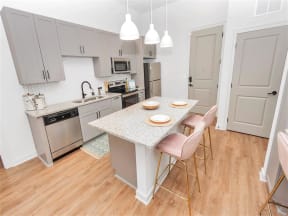 Kitchen with Grey Cabinets at DAWSON PARK APARTMENTS, BATON ROUGE, Louisiana