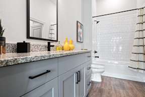 Bathroom with a White Toilet at DAWSON PARK APARTMENTS, Louisiana, 70809