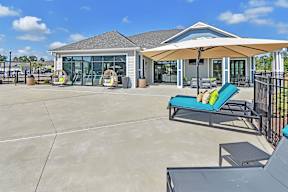 Relaxing Area Near Pool at GRANDVIEW AT CLEAR POND APARTMENTS, MYRTLE BEACH, South Carolina