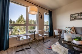 Living Area With Balcony at Avaya Ridge Apartments, Renton, WA, 98055