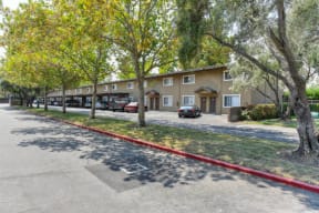 Community Exterior with Street, Grass and Trees  at Olympus Park Apartments, Roseville, CA, 95661