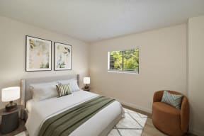 a bedroom with a bed and a chair at Croft Plaza Apartments, California