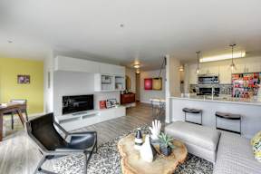 Living Room Kitchen and Dining Area at The Summit at Lake Union, Seattle, WA