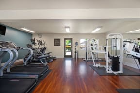 our gym is equipped with a variety of cardio equipment  at Olympus Park Apartments, Roseville, 95661