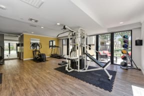 Communit Fitness center with yellow accent wall