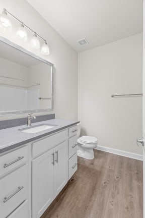 Guest Bathroom with lots of storage and a soaking tub
