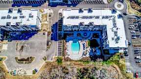 Aerial view of the clubhouse building at 3800 Aqua Apartments