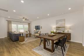 Open concept living and dining area at The Courts at Maverick Yards Apartments, Mauldin, SC