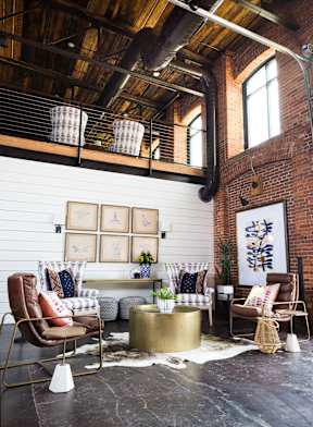Cotton Mill Apartments clubhouse with a table and chairs